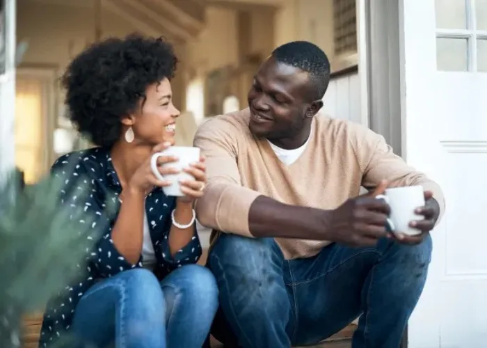 couple sitting and talking.